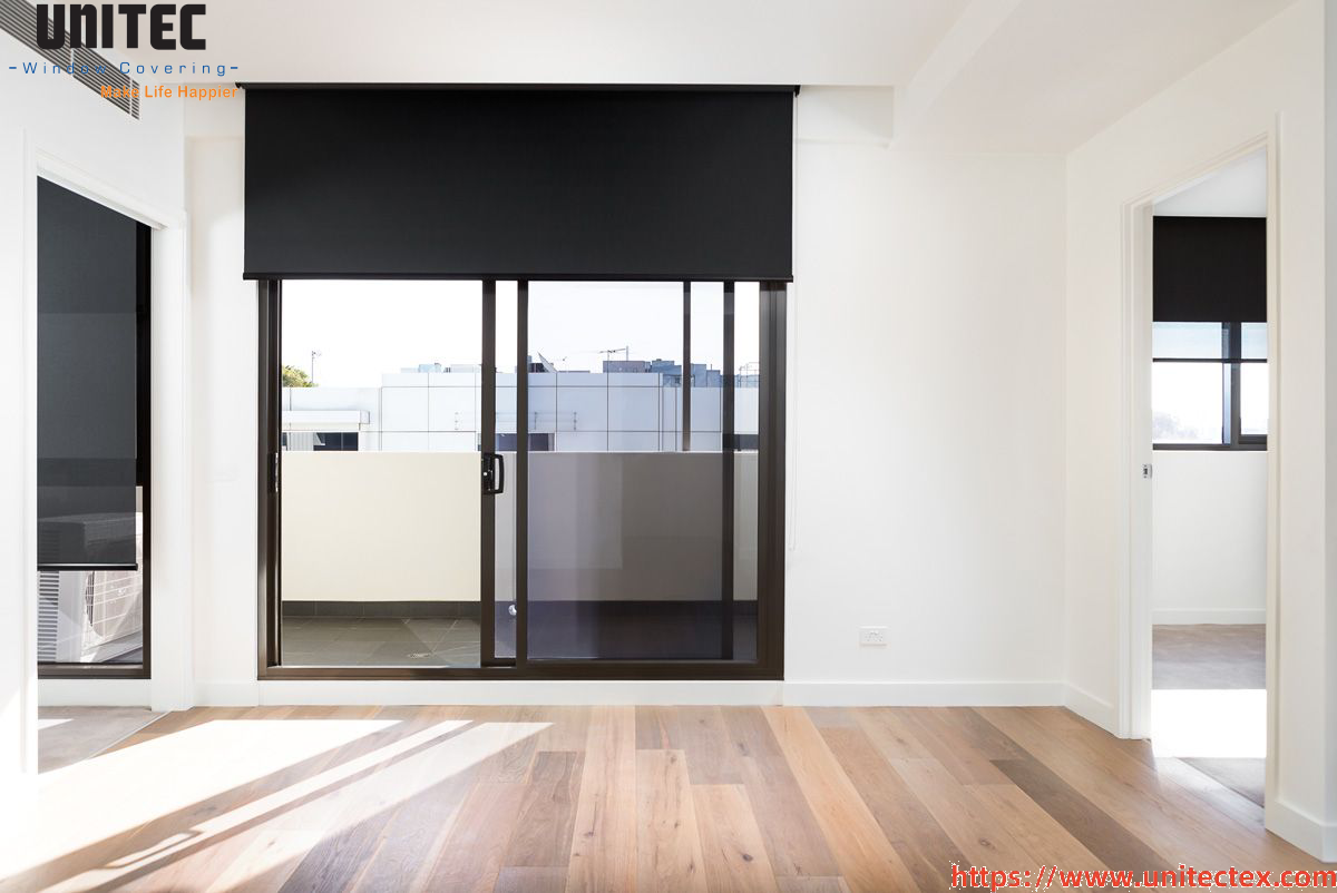 Designer black roller blinds